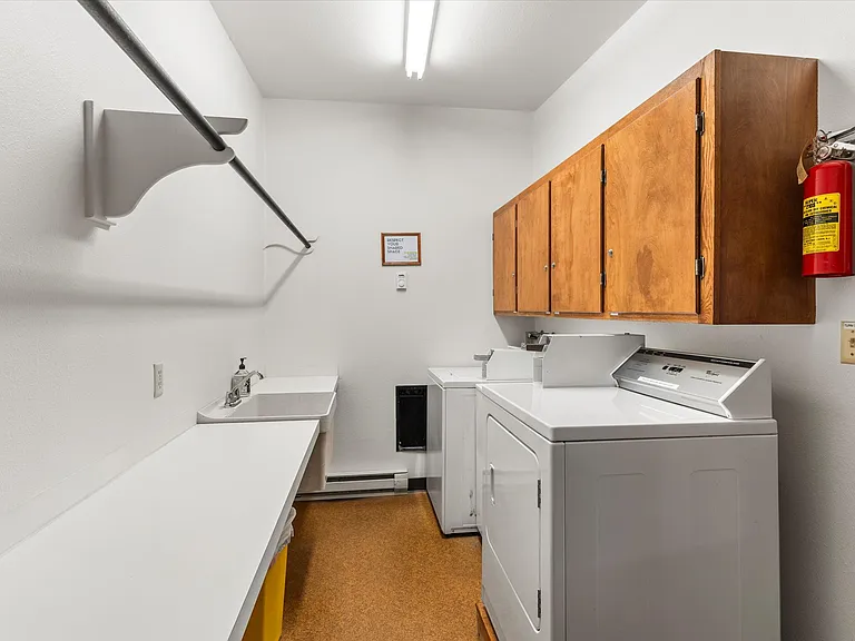 Large Laundry Room. Each unit has it's own large cubby. Clean and easy.