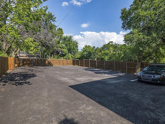 Gated parking in. the backyard.