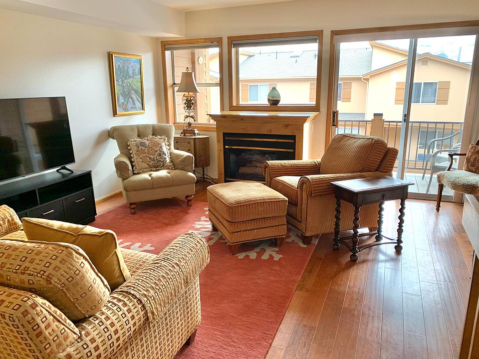 Living room and fireplace; brand new LG smart TV