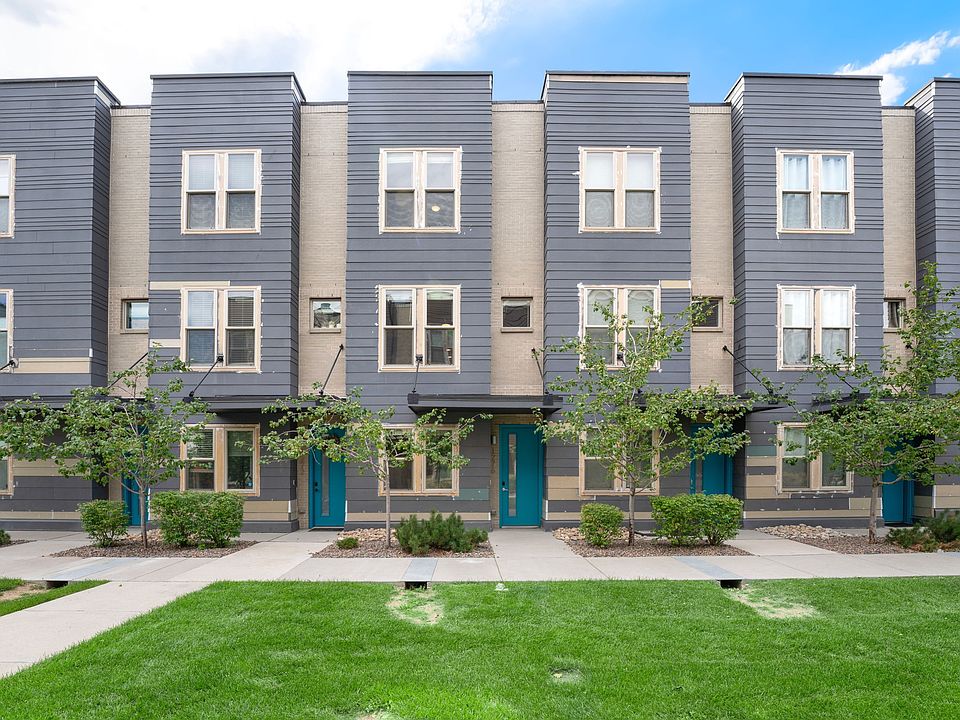 Prime Location: Enjoy a private entrance and professionally maintained green space right outside your vibrant teal front door.