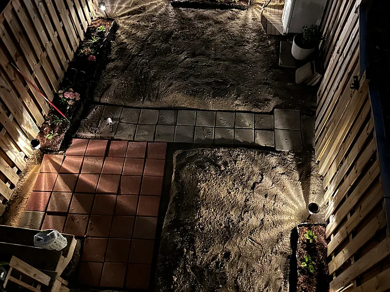 Solar garden lights give this space usability all day and most of the night.