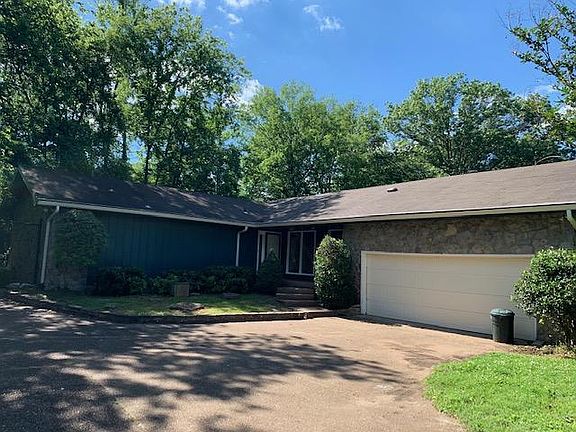 Two-car garage. Driveway parking and turnaround