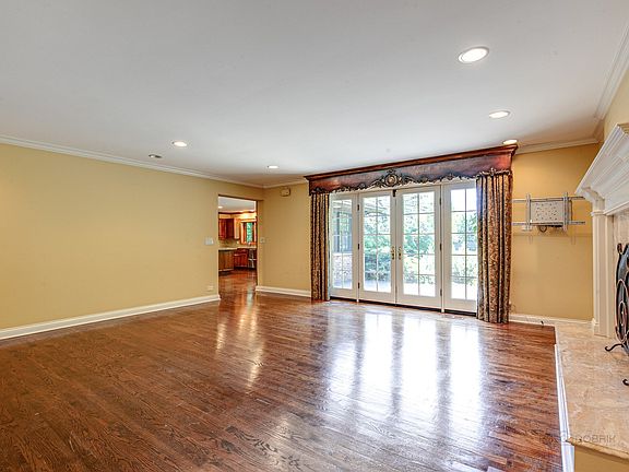 French Doors lead to the blue stone patio.