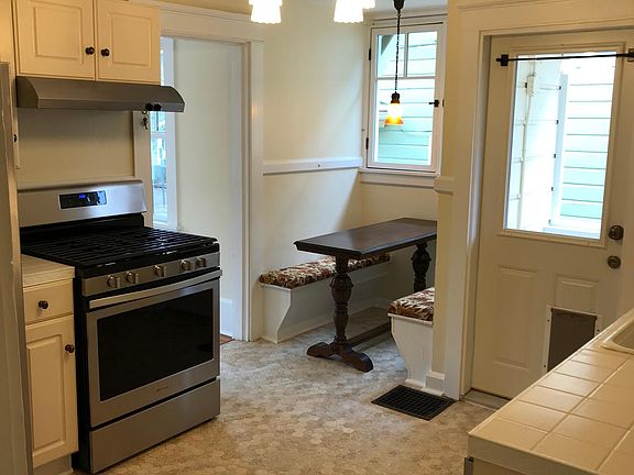 Quaint Kitchen with New Appliances and Breakfast Nook