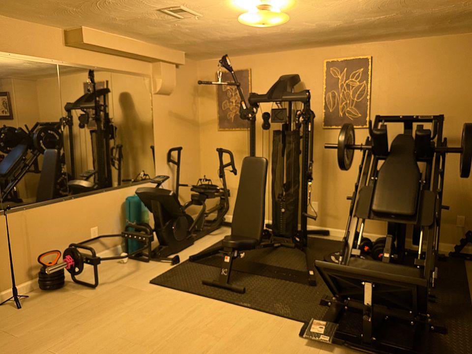 There's an elegant office with a large desk right in front of the gym, I'll add the pictures soon. There's a large tv for entertainment while working out.