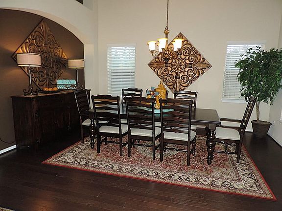 All of your friends and family can gather in this banquet-sized formal dining area.