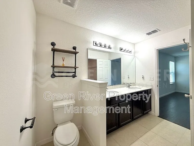 8704 Lake George Cir W — Photo 22