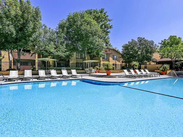 Our outdoor swimming area includes a hot tub