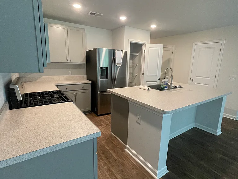 Kitchen - gas stove and updated sink with glass rinser attachement