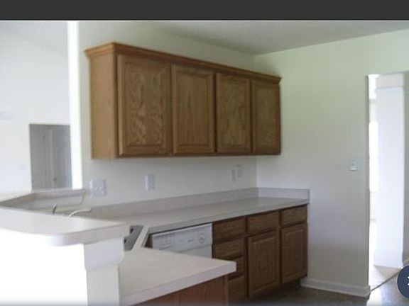 Kitchen overlooks family rm.