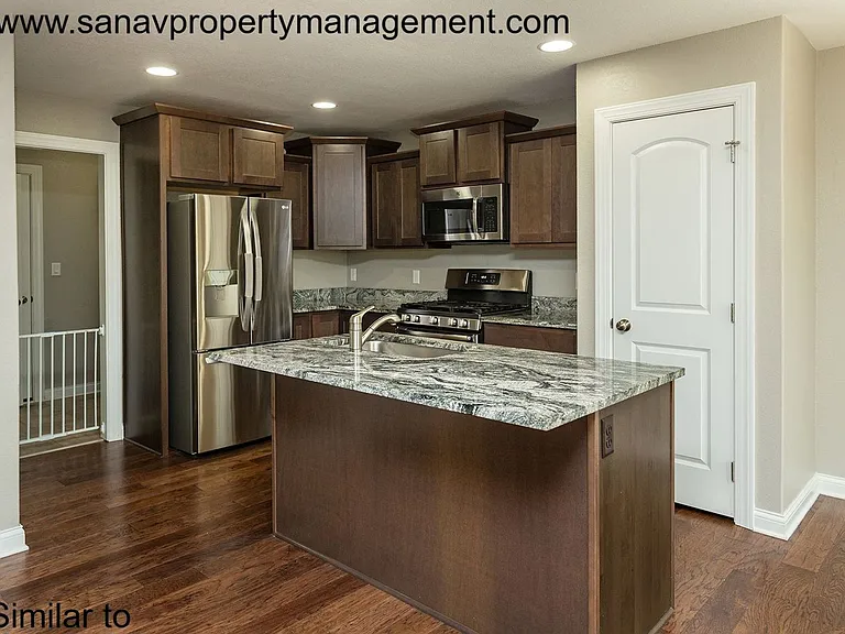 303 Marie Ave — Photo 3