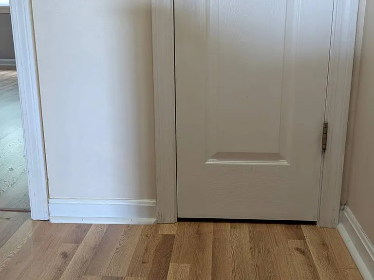 Closet located next to the Bedroom 1 door.