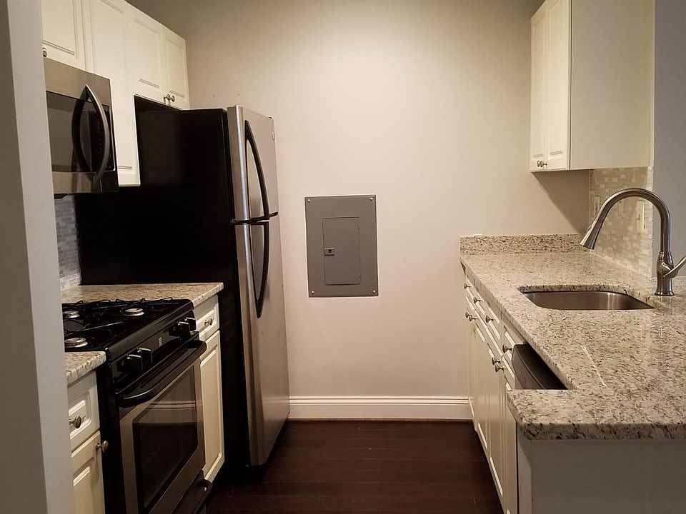 Enjoy gas cooking in your upgraded kitchen w/ white and grey granite counter tops and wash your fresh vegetables in deep sink