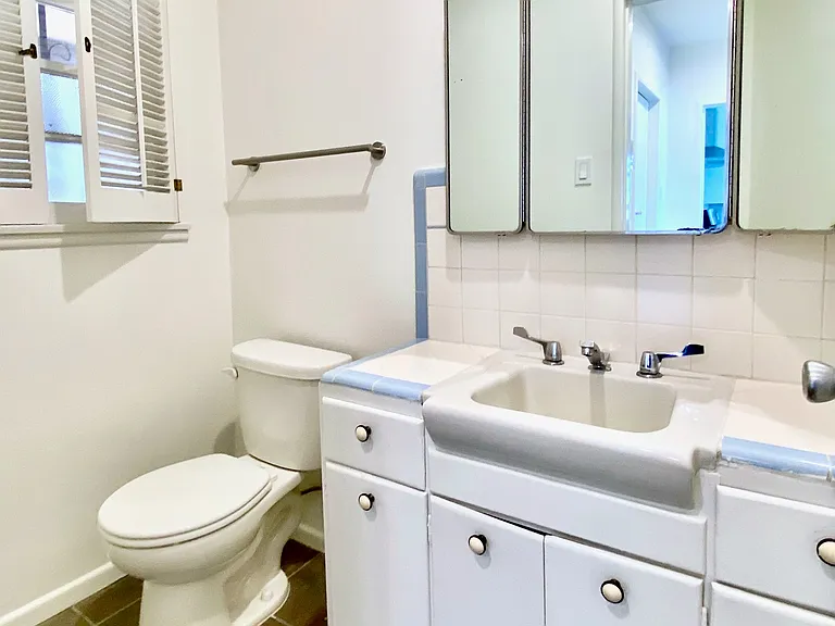 Convenient powder room on upper level.
