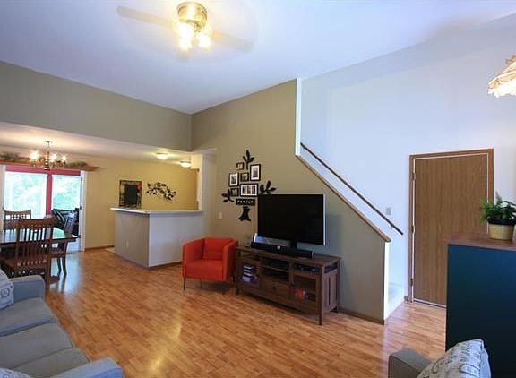 Family room connects to breakfast room and all-seasons room.