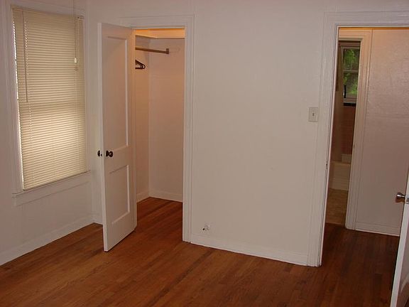 Large bedroom with a walk-in closet