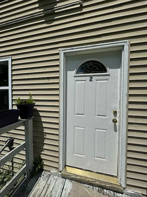 57 W State St #2