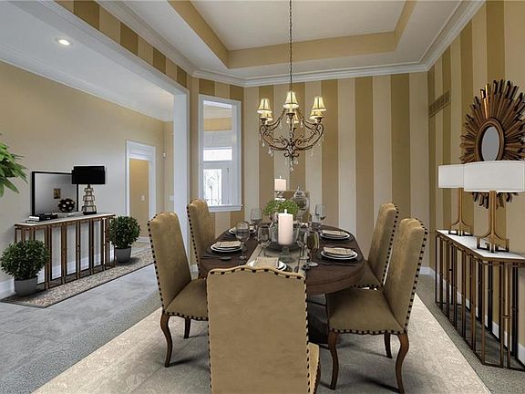 ELEGANT FORMAL DINING, CROWN MOLDING AND DESIRABLE OPEN FLOORPLAN