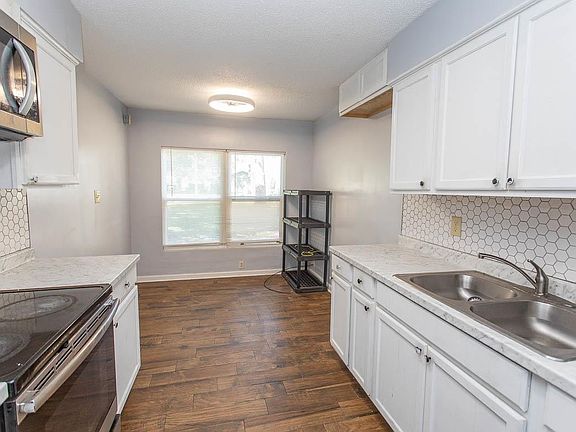 4th image of 2000 Greens Blvd. #15-B