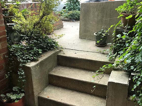 Front entrance just 3 steps down from street level