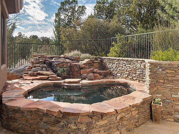 BUILT IN HOT TUB & WATERFALL