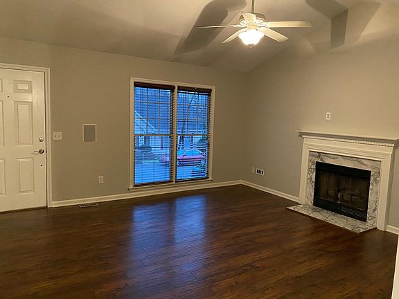 Spacious living room with vaulted ceilings.
