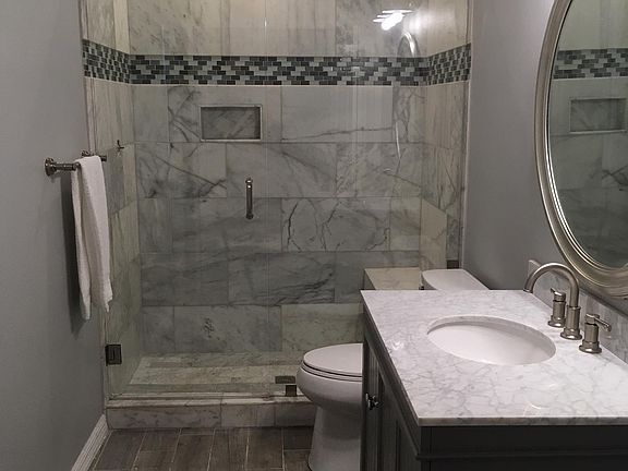 Bathroom with Washer and dryer closet.