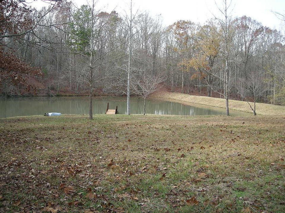 1 1/2 acre fishing lake/swimming... spring fed/Clean