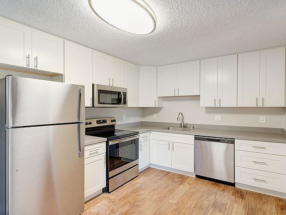 Updated kitchens with premium finishes are available for upgrade.