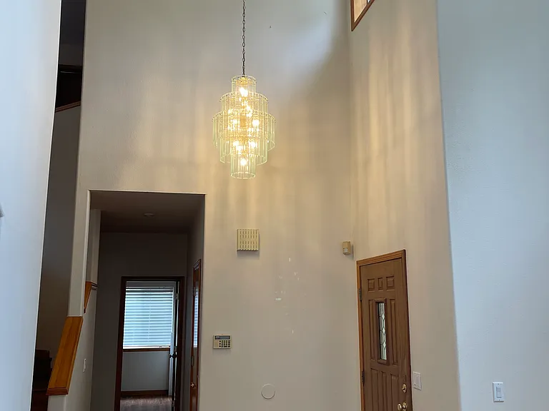 Enteryway view with high ceiling.