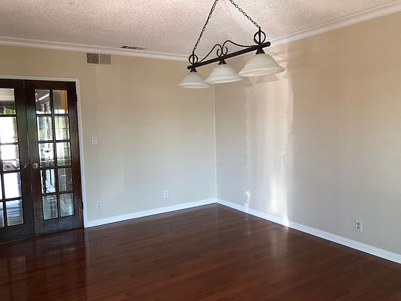 living room and french doors to living quarters