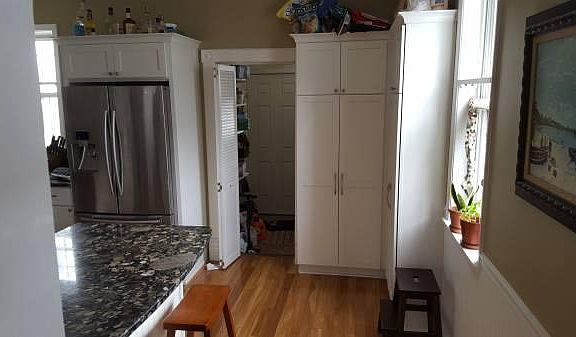 View from kitchen into back entrance/laundry