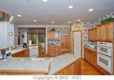 Open kitchen w/ breakfast bar