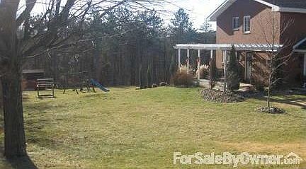 Left side of house : When the plants come in, the Patio is the best place to have your morning coffe