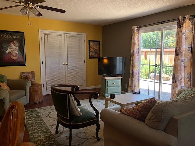 Living room looking into back yard through double-paned slider. (The apartment will not be furnished.)