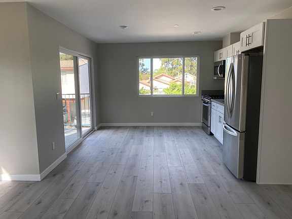 Balcony and kitchen (all brand new appliances).