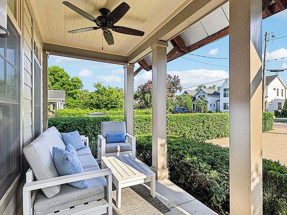 Enjoy quiet mornings or people-watching on this inviting front porch. Prime walkable location in 12 South, surrounded by boutiques, restaurants, and green spaces.
