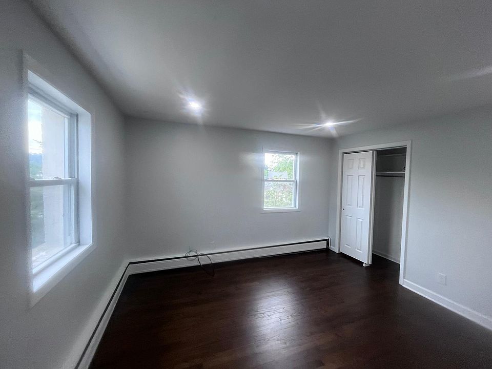 bed room one. lots of light, one closet, faces the street