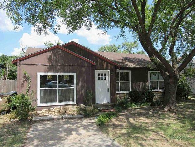 Front of house. New door. New windows. Roof has been replaced & new gutters installed since this photo was taken.