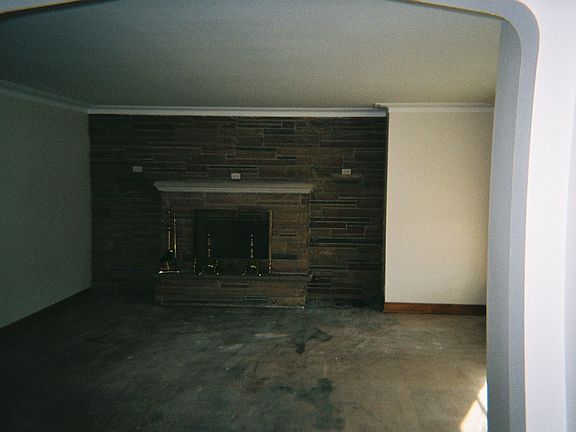 Stone fireplace in living room