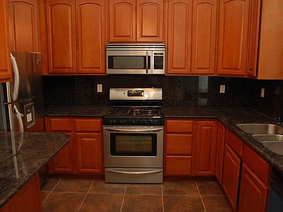 Another picture of The Gourmet Kitchen triple stainless stee