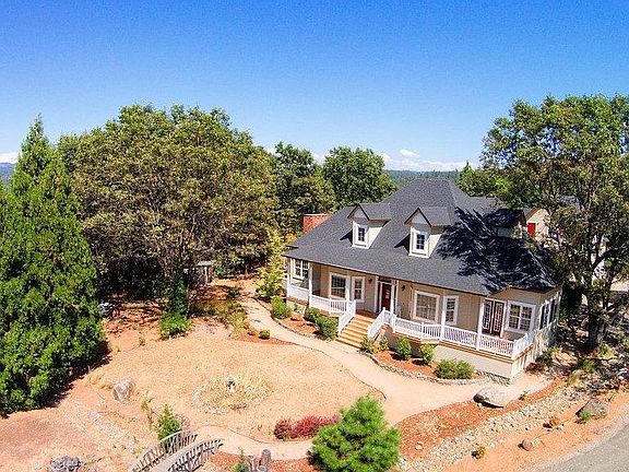 Aerial view of front of home with Crystal Mountains in the back looking East.