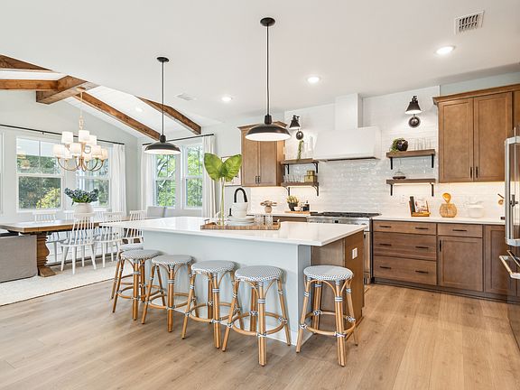 Kitchen with open shelves pendant lighting