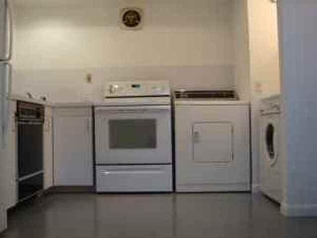 Kitchen with washer/dryer