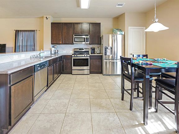 4th image of 6939 Hazelnut Ln