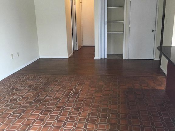 living room looking to eat in kitchen area and 1st floor lau