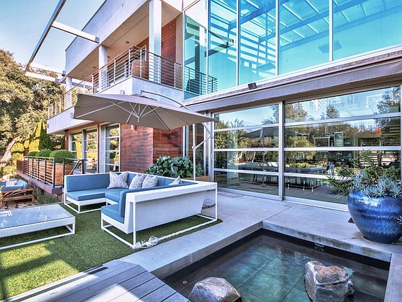 outdoor pool seating areawith water feature