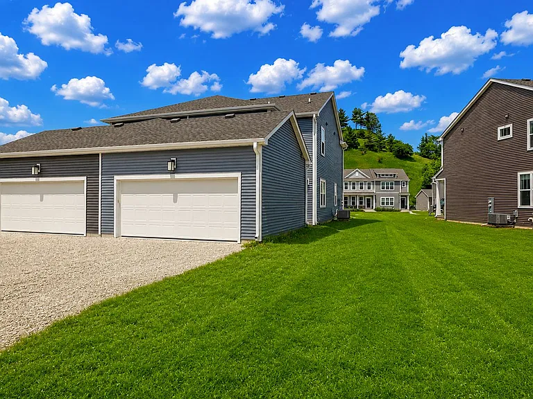Attached 2 Car Garage - Yard has been virtually edited. Exterior yard and patio are still under construction.