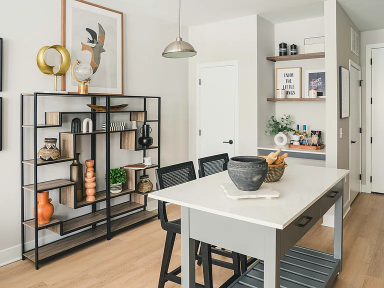 Experience culinary convenience in our apartments with a movable chef's island, complete with built-in drawers and pull-up bar seating.