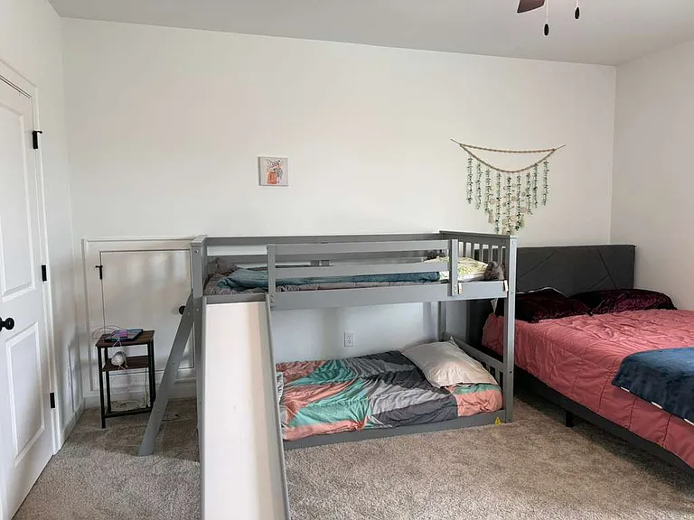 Upstairs bedroom with attached restroom